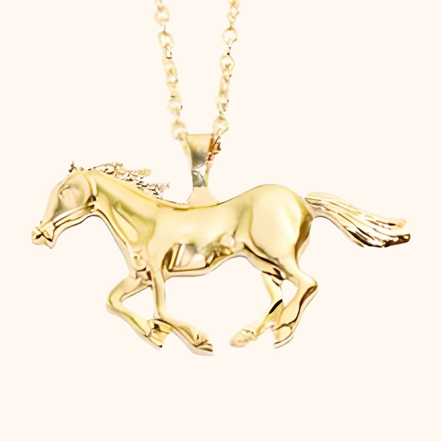 Collier doré petit cheval