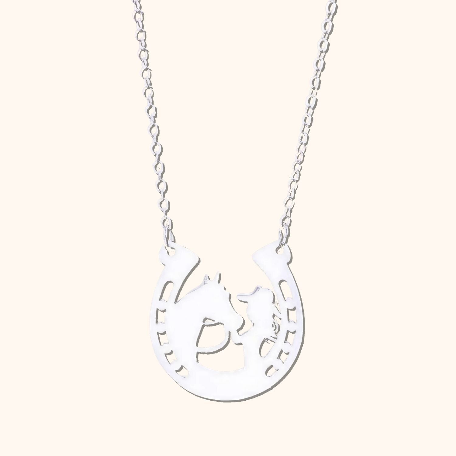 Pendentif fer à cheval cavalier