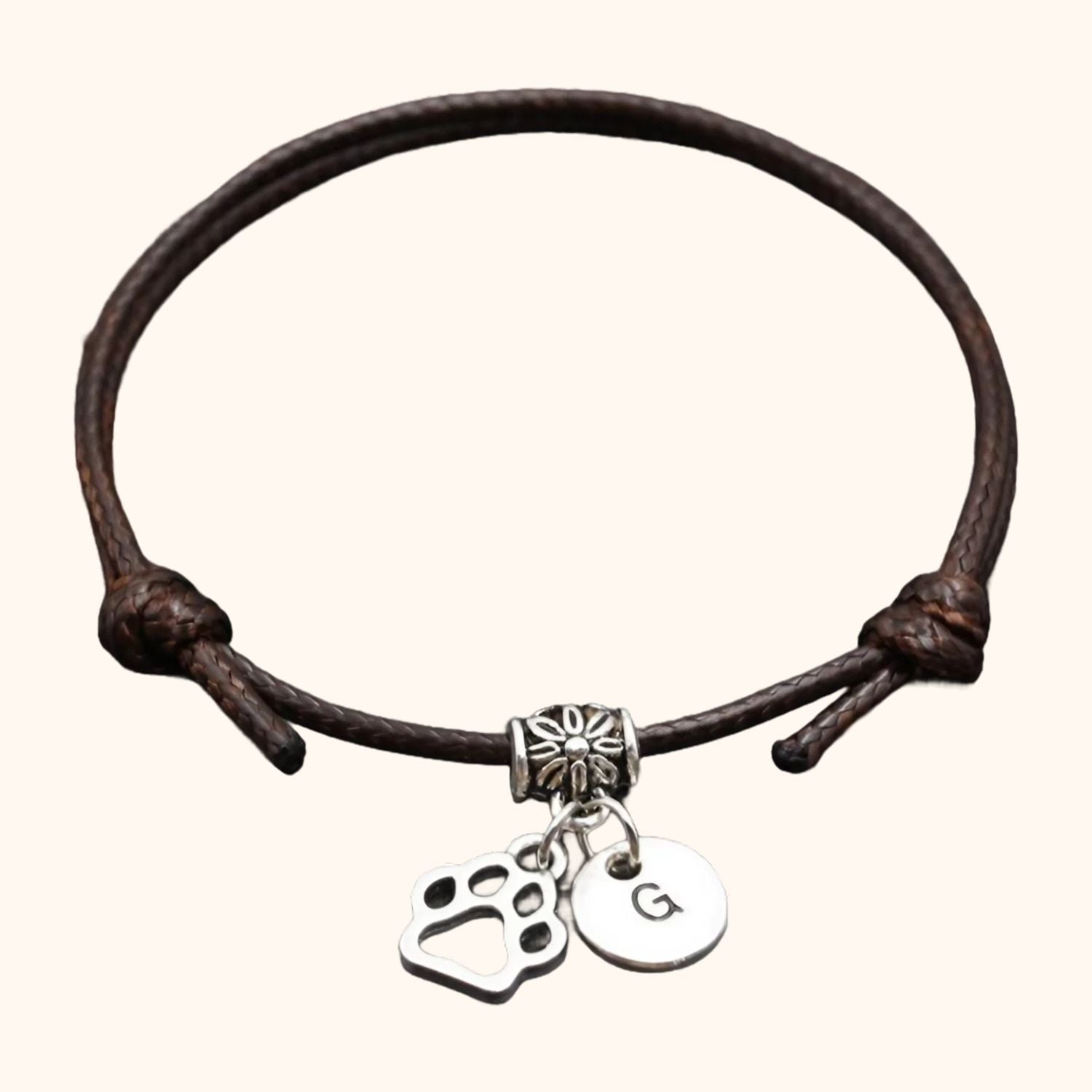 Bracelet marron patte de chien et sa lettre