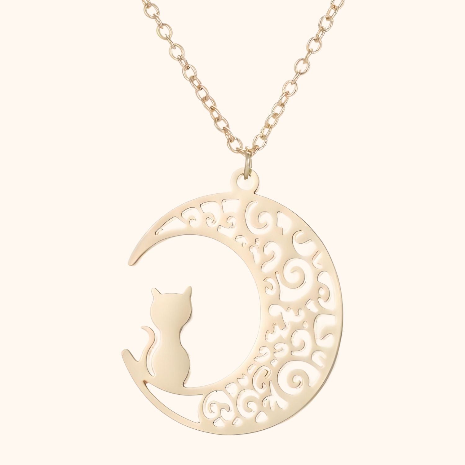 Collier doré chat perché sur la lune