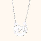 Pendentif fer à cheval cavalier