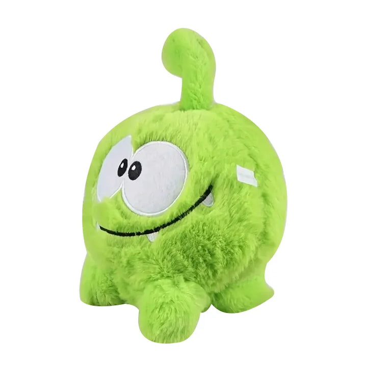 Une adorable petite grenouille en peluche vert avec de grands yeux et un sourire espiègle