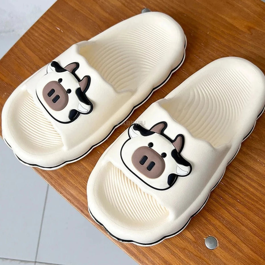 Claquettes détente motif vache