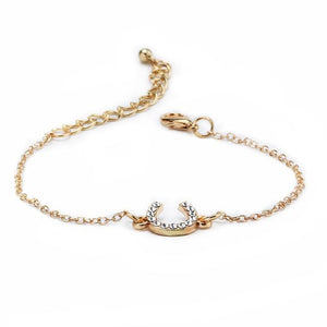 Bracelet fer à cheval - Le Petit FermierUn délicat bracelet en argent orné d'un fer à cheval scintillant, symbole d'élégance et de chance